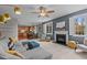 Spacious living room with fireplace that opens to the kitchen and breakfast area, perfect for entertaining and relaxing at 3725 Song Sparrow Dr, Wake Forest, NC 27587