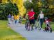 Group of people enjoying a walk and bike ride along the Smithfield Neuse Riverwalk Greenway at 384 Hopewell Branch Ct, Smithfield, NC 27577