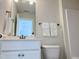 This bathroom has a single sink and a mirror at 3908 Bostwyck Dr, Fuquay Varina, NC 27526