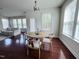 Bright dining area featuring hardwood floors and natural light at 3908 Bostwyck Dr, Fuquay Varina, NC 27526