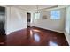 Sunlit dining room with modern lighting and hardwood floors at 3908 Bostwyck Dr, Fuquay Varina, NC 27526