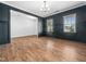 Hardwood flooring, wainscoting and views through the house at 401 Club Center Dr, Youngsville, NC 27596