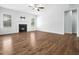 Bright living room with wood floors, fireplace and white trim at 401 Club Center Dr, Youngsville, NC 27596