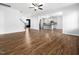 Open floor plan showcasing living room, staircase and kitchen at 401 Club Center Dr, Youngsville, NC 27596
