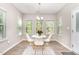 Cozy dining area with natural light and seating for four at 420 Cahors Trl, Holly Springs, NC 27540
