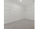 Walk-in closet showing multiple tiers of white wire shelving for optimal storage solutions at 426 Adams Pointe Ct, Angier, NC 27501
