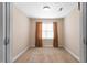 Empty bedroom with neutral walls, carpet flooring and a bright window, offering a blank canvas at 43 Summerseat Way, Bunnlevel, NC 28323