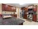 Well-appointed kitchen featuring stainless steel appliances, granite countertops, and ample cabinet space for storage at 43 Summerseat Way, Bunnlevel, NC 28323