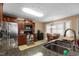 Modern kitchen with stainless steel appliances, dark wood cabinetry, and a cozy breakfast nook with bay windows at 43 Summerseat Way, Bunnlevel, NC 28323