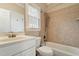 Cozy bathroom with tiled shower-tub, vanity and toilet at 4313 Branchwood Dr, Durham, NC 27705