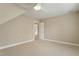 A bedroom featuring a ceiling fan and beige carpeting at 4313 Branchwood Dr, Durham, NC 27705