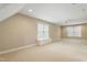 Spacious room with wall-to-wall carpeting and built-in bench at 4313 Branchwood Dr, Durham, NC 27705