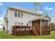 Back exterior view of home featuring a wooden deck and cozy screened-in porch at 4313 Branchwood Dr, Durham, NC 27705