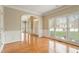 Bright foyer area with hardwood floors, crown molding, and front door views at 4313 Branchwood Dr, Durham, NC 27705