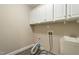 A Laundry Room with a utility sink and cabinets above at 4313 Branchwood Dr, Durham, NC 27705