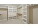 Organized walk-in closet with custom shelving and drawers for ample storage at 4313 Branchwood Dr, Durham, NC 27705
