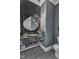Chic powder room featuring a modern marble countertop and custom lighting fixtures at 472 Stonecrest Way, Pittsboro, NC 27312