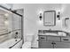 Updated bathroom featuring a shower over tub combination and modern black fixtures at 472 Stonecrest Way, Pittsboro, NC 27312