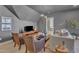 Comfortable bonus room features a TV and additional seating at 472 Stonecrest Way, Pittsboro, NC 27312