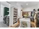 A combined closet-laundry space offers ample clothing and shoe storage with laundry setup at 472 Stonecrest Way, Pittsboro, NC 27312