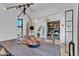 Bright dining room featuring decorative chandelier, decor and open view to office space at 472 Stonecrest Way, Pittsboro, NC 27312