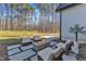 Inviting backyard firepit area with comfortable seating and landscaping at 472 Stonecrest Way, Pittsboro, NC 27312