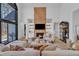 Cozy living room featuring modern fireplace, comfortable seating, and stylish decor at 472 Stonecrest Way, Pittsboro, NC 27312