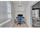 Bright home office space with modern lighting, window, and comfortable seating at 472 Stonecrest Way, Pittsboro, NC 27312