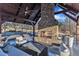 Outdoor living space featuring fireplace, plush seating, and covered patio at 472 Stonecrest Way, Pittsboro, NC 27312