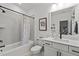 Bathroom features subway tile, black fixtures, and modern finishes, along with a decorative shower curtain at 494 Terry Rd, Hillsborough, NC 27278