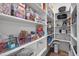 Walk-in pantry with ample shelving for organized food storage and clear containers for easy viewing at 494 Terry Rd, Hillsborough, NC 27278