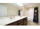 Bathroom featuring double sinks and a shower and tub combination at 504 Prince Dr, Holly Springs, NC 27540