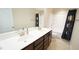 Bathroom featuring double sinks and a shower and tub combination at 504 Prince Dr, Holly Springs, NC 27540