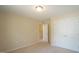 Bedroom features carpeted floors, neutral walls, and a closet at 504 Prince Dr, Holly Springs, NC 27540