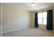 Cozy bedroom featuring carpet and natural light from the window at 504 Prince Dr, Holly Springs, NC 27540