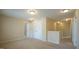 Bedroom has carpeted floors, neutral walls, and a closet at 504 Prince Dr, Holly Springs, NC 27540