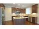 Contemporary kitchen with stainless steel appliances and granite countertops at 504 Prince Dr, Holly Springs, NC 27540