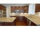 Gourmet kitchen with stainless steel appliances and granite countertops at 504 Prince Dr, Holly Springs, NC 27540