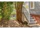 Backyard featuring a cozy outdoor seating area and access to a deck via stone steps at 507 Parkside Cir, Chapel Hill, NC 27516