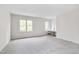 Bright bedroom with plush carpeting, ample natural light, and a versatile layout at 507 Parkside Cir, Chapel Hill, NC 27516