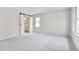 Bright bedroom featuring plush carpeting, ample natural light, and ensuite bathroom access at 507 Parkside Cir, Chapel Hill, NC 27516
