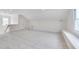 Bright and spacious bonus room featuring windows and neutral carpet at 507 Parkside Cir, Chapel Hill, NC 27516