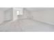 Bright and spacious bonus room with neutral carpet and plenty of natural light at 507 Parkside Cir, Chapel Hill, NC 27516