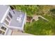 Aerial view of a deck with white seating, surrounded by lush greenery at 507 Parkside Cir, Chapel Hill, NC 27516