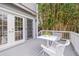 Cozy deck with French doors and outdoor seating, perfect for relaxing at 507 Parkside Cir, Chapel Hill, NC 27516