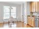 Bright dining area with hardwood floors and views to the outside at 507 Parkside Cir, Chapel Hill, NC 27516