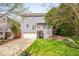 Charming two-story home with a deck, landscaped yard, and a two-car garage at 507 Parkside Cir, Chapel Hill, NC 27516