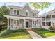 Charming two-story home with gray siding, white trim, covered front porch, and inviting curb appeal at 507 Parkside Cir, Chapel Hill, NC 27516