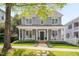 Charming two-story home with gray siding, white trim, covered front porch, and inviting curb appeal at 507 Parkside Cir, Chapel Hill, NC 27516