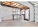 Attached garage with workbench and outdoor access, offering convenience and functionality at 507 Parkside Cir, Chapel Hill, NC 27516